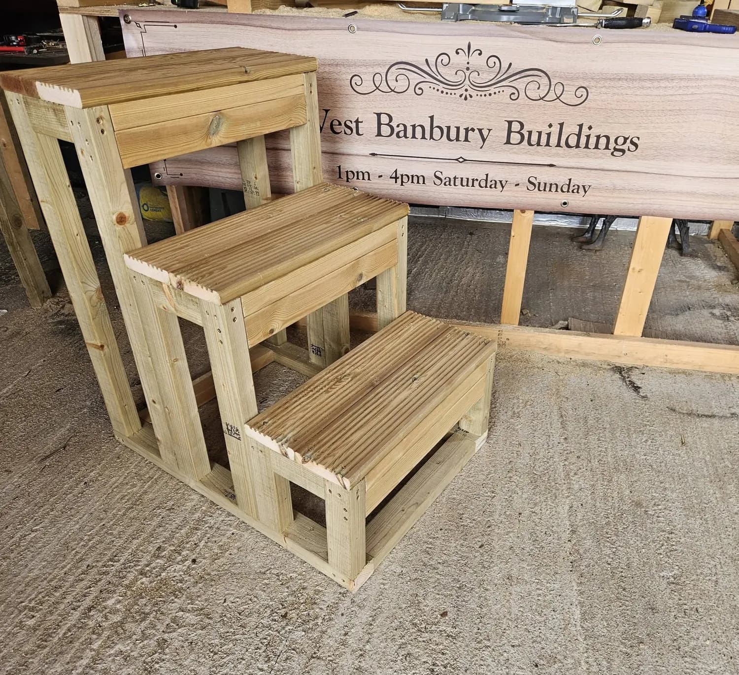 A stepped timber unit with slatted decked treads, photographed in the workshop